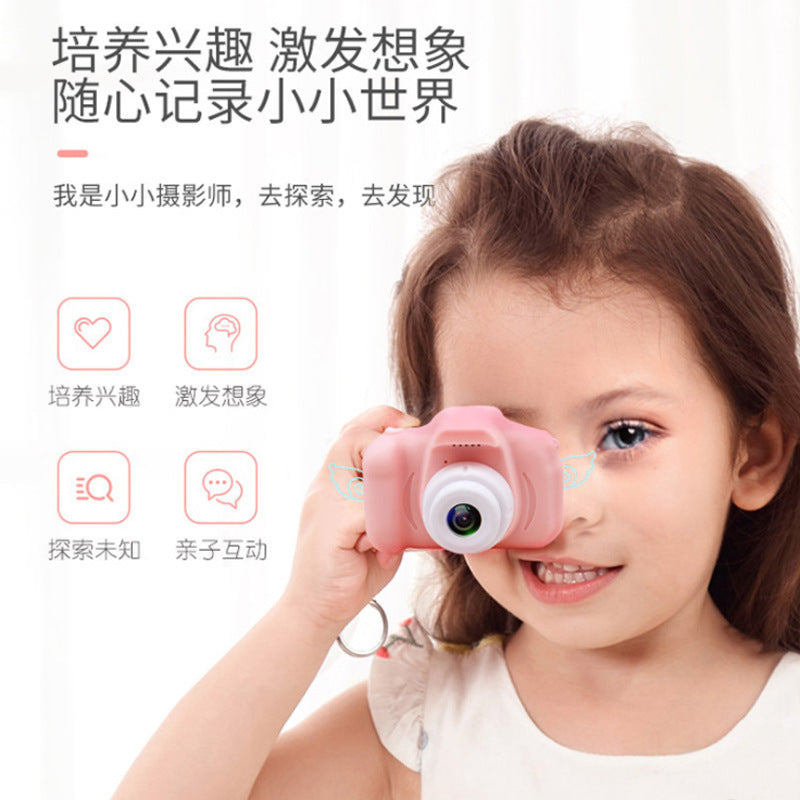 Cross-border X2 mini cartoon children's digital camera shooting toy camera can take pictures with one button camera manufacturers wholesale